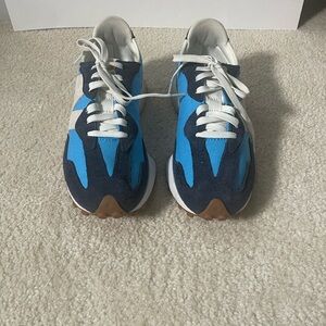 Men’s Size 9/ Women’s Size 10. New Balance 327 Blue Lifestyle Sneakers